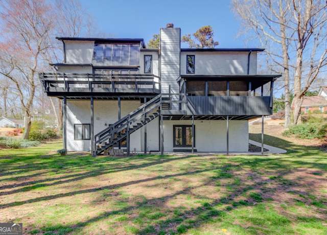Property at 5284 Silver Creek Dr SW, Lilburn, GA 30047, 4 beds, 5 baths