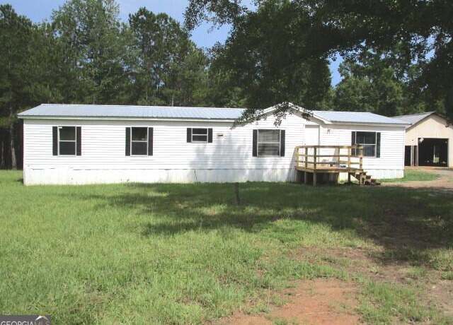 Property at 1550 Hut Rd, Box Springs, GA 31801, 4 beds, 2 baths