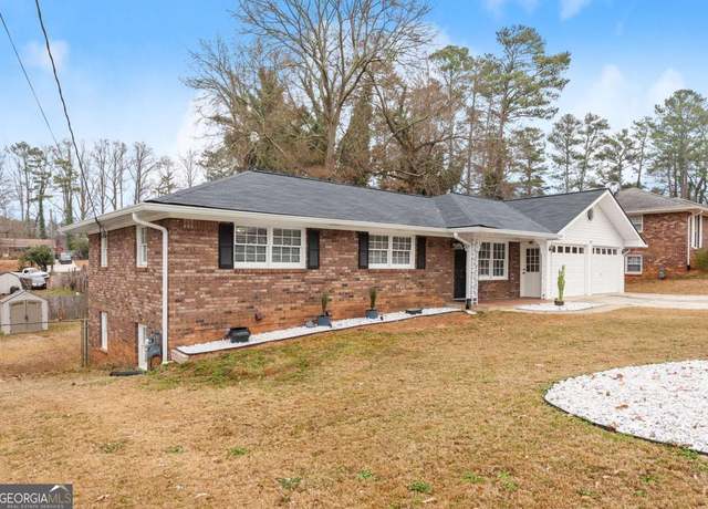 Property at 1283 Woodleigh Rd SW, Marietta, GA 30008, 5 beds, 3 baths