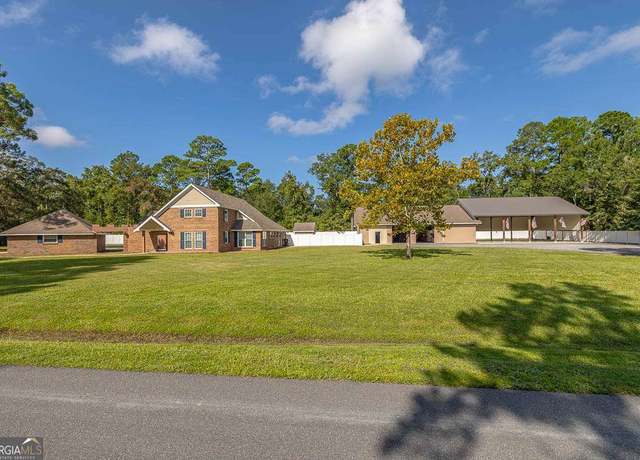 Property at 145 Oyster Rd, Brunswick, GA 31523, 4 beds, 2.5 baths