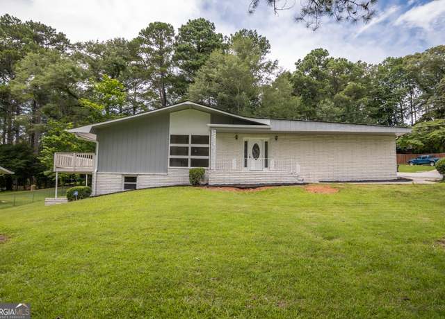 Property at 2743 NW Lake Capri Dr, Conyers, GA 30012, 5 beds, 3 baths