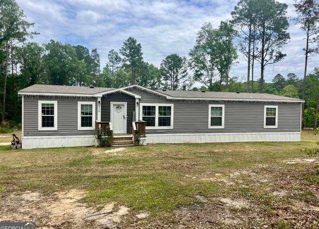 Property at 310 Magnolia Bluff Dr, Metter, GA 30439, 4 beds, 2 baths