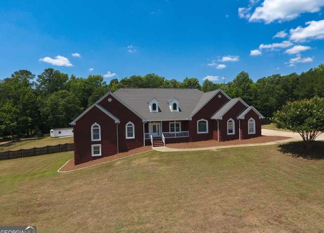 Property at 1015 N Walkers Mill Rd, Griffin, GA 30223, 6 beds, 5.5 baths