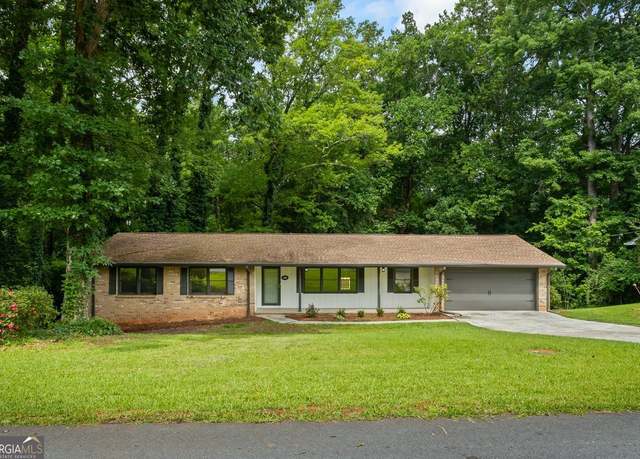 Property at 1300 White Oak St SE, Conyers, GA 30013, 4 beds, 3 baths
