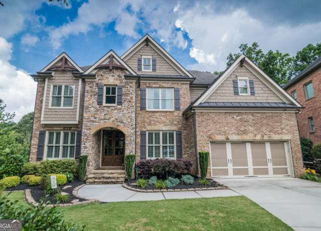 Property at 6248 Sunshine Cove Ln, Buford, GA 30518, 5 beds, 5 baths