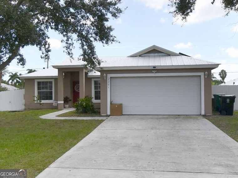 Photo of 2201 SW Plymouth St Port Saint Lucie, FL 34953