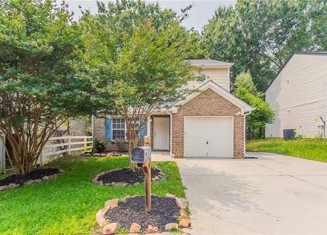 Property at 7070 Ravenwood Ln, Lithonia, GA 30038, 4 beds, 3 baths