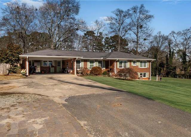 Property at 4983 Arcado Rd SW, Lilburn, GA 30047, 5 beds, 2 baths