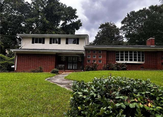 Property at 819 Venetta Pl NW, Atlanta, GA 30318, 5 beds, 3 baths