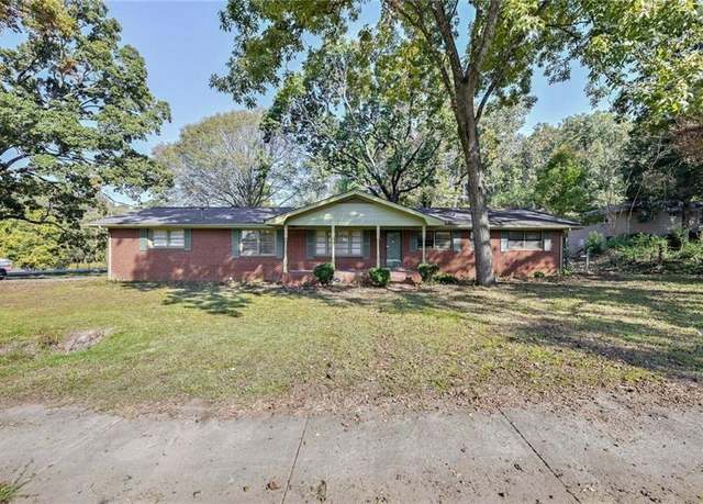 Property at 1189 E Fayetteville Rd, Riverdale, GA 30296, 4 beds, 2 baths