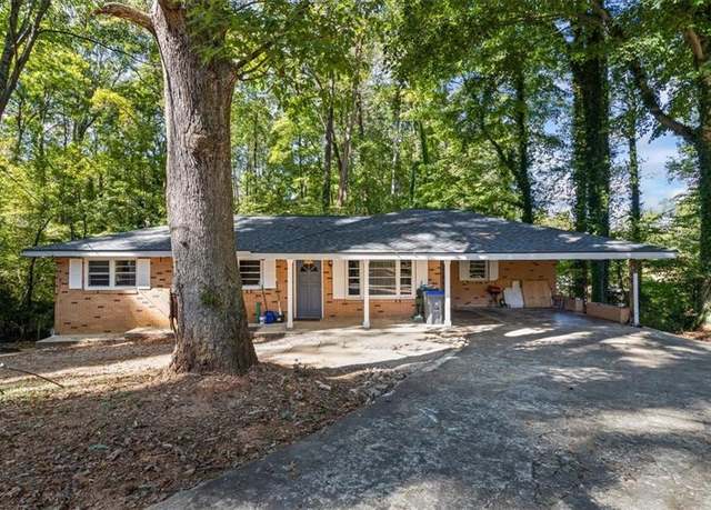Property at 422 White Oak Dr NW, Lilburn, GA 30047, 6 beds, 3 baths