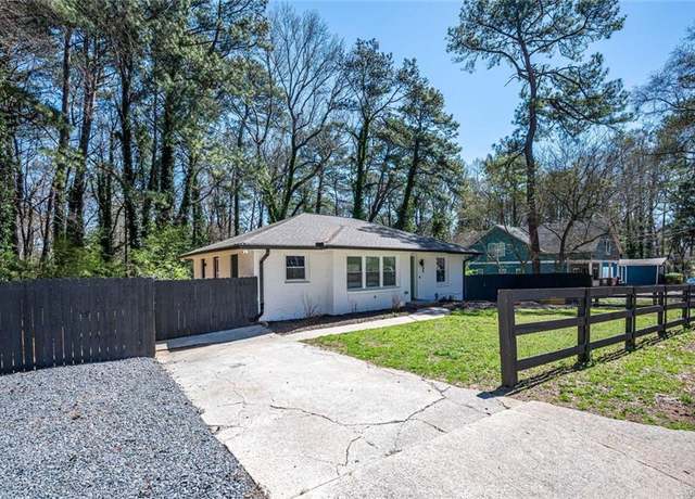 Property at 1105 Gun Club Rd NW, Atlanta, GA 30318, 5 beds, 3 baths