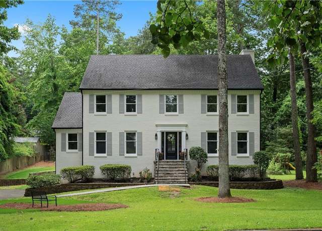 Property at 7110 Northgreen Dr, Atlanta, GA 30328, 4 beds, 3 baths