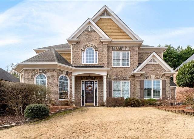 Property at 6318 Sunshine Cove Ln, Buford, GA 30518, 5 beds, 3 baths