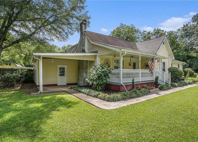 Property at 878 Jackson St, Locust Grove, GA 30248, 4 beds, 2 baths