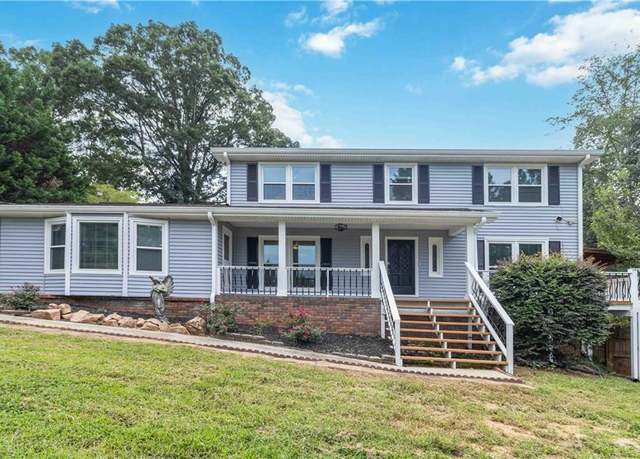 Property at 1647 Grandeus Ln SW, Stone Mountain, GA 30087, 4 beds, 3 baths