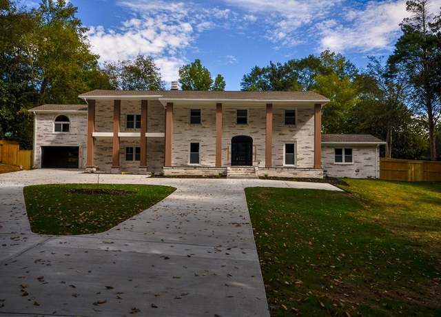 Property at 4395 Woodland Brook Dr SE, Atlanta, GA 30339, 7 beds, 6.5 baths