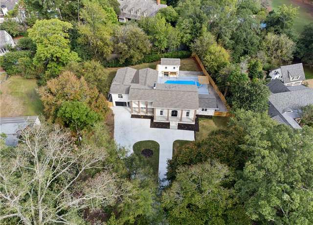 Property at 4395 Woodland Brook Dr SE, Atlanta, GA 30339, 7 beds, 6.5 baths