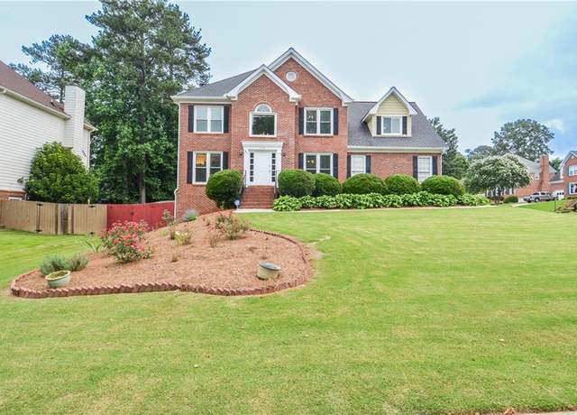 Property at 930 Cedar Bluff Trl SW, Lilburn, GA 30047, 5 beds, 3.5 baths