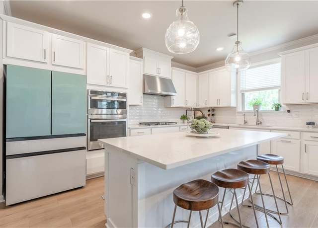 Property at 8540 Stratford Oaks Ave, Ball Ground, GA 30107, 5 beds, 4.5 baths