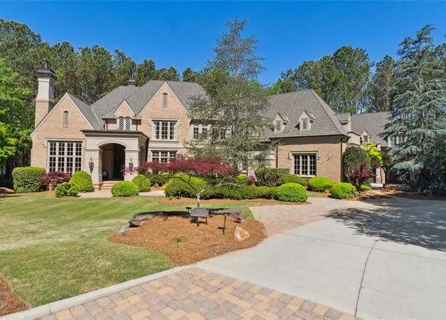 Property at 811 Flathead Pass, Suwanee, GA 30024, 7 beds, 8 baths