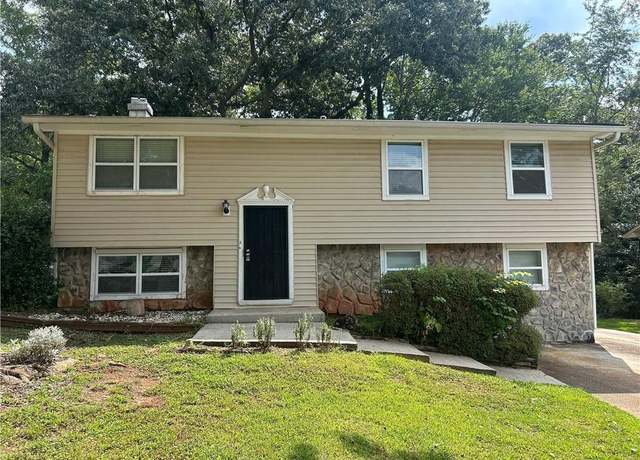 Property at 1214 Mannbrook Dr, Stone Mountain, GA 30083, 4 beds, 2 baths