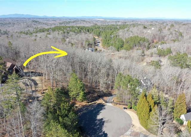Property at 8555 Woodland Brooke Trl, Cumming, GA 30028