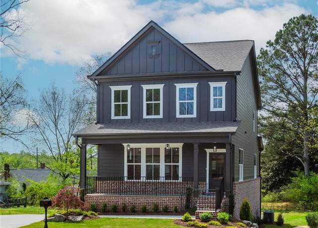 Property at 5211 Spring St, Flowery Branch, GA 30542, 4 beds, 3.5 baths