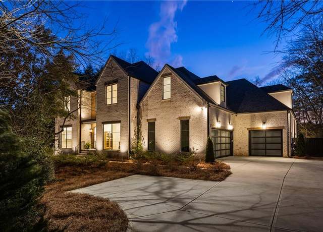 Property at 5060 Lake Forrest Dr, Atlanta, GA 30342, 7 beds, 7.5 baths