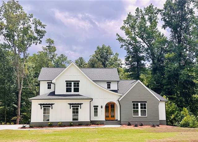 Property at 6312 Woodstock Rd, Woodstock, GA 30102, 3 beds, 3.5 baths