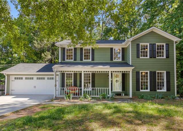 Property at 1027 Spring Mill Dr SW, Lilburn, GA 30047, 4 beds, 2.5 baths
