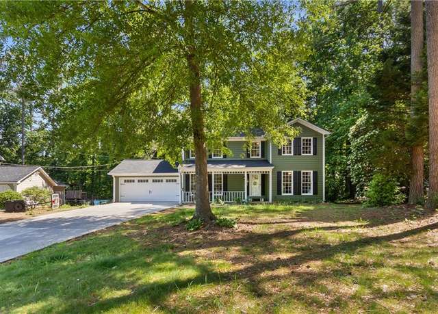 Property at 1027 Spring Mill Dr SW, Lilburn, GA 30047, 4 beds, 2.5 baths