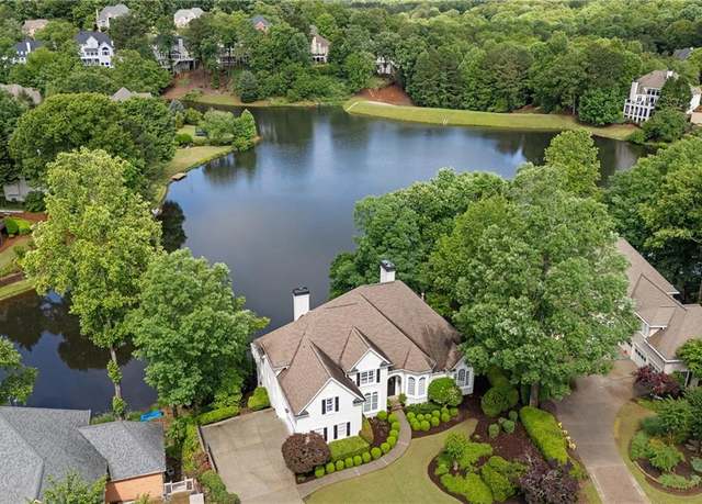 Property at 9115 Nesbit Lakes Dr, Alpharetta, GA 30022, 5 beds, 4.5 baths