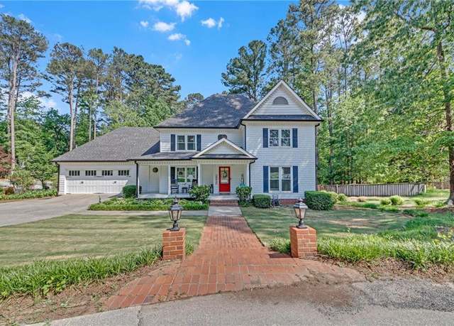 Property at 4985 Miller Rd SW, Lilburn, GA 30047, 4 beds, 3 baths