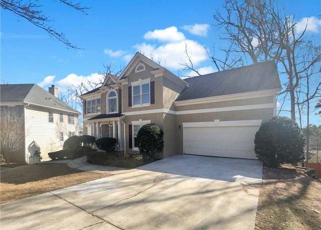 Property at 6719 Winterberry Ridge Dr, Stone Mountain, GA 30087, 5 beds, 3.5 baths