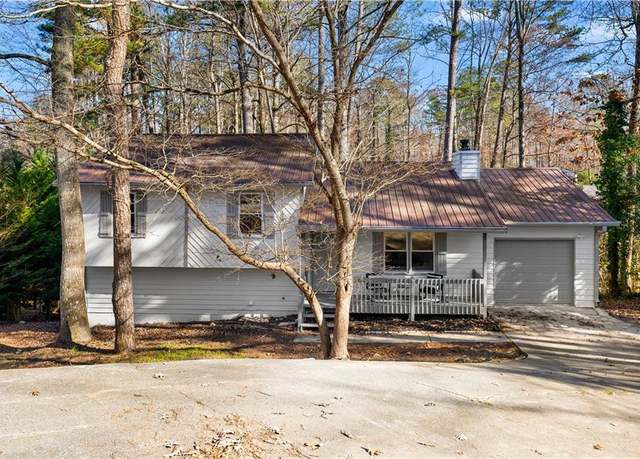 Property at 7000 Woodland Pl NW, Kennesaw, GA 30152, 3 beds, 2 baths