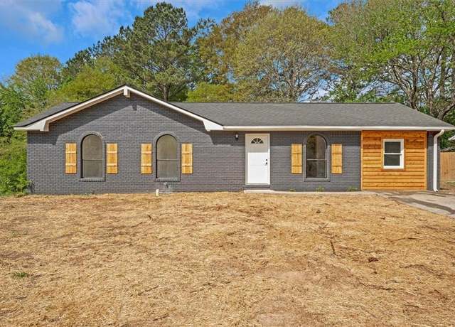 Property at 8833 E Bourne Dr E, Jonesboro, GA 30238, 4 beds, 2 baths
