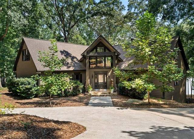 Property at 6680 Woodlake Dr, Flowery Branch, GA 30542, 7 beds, 6 baths