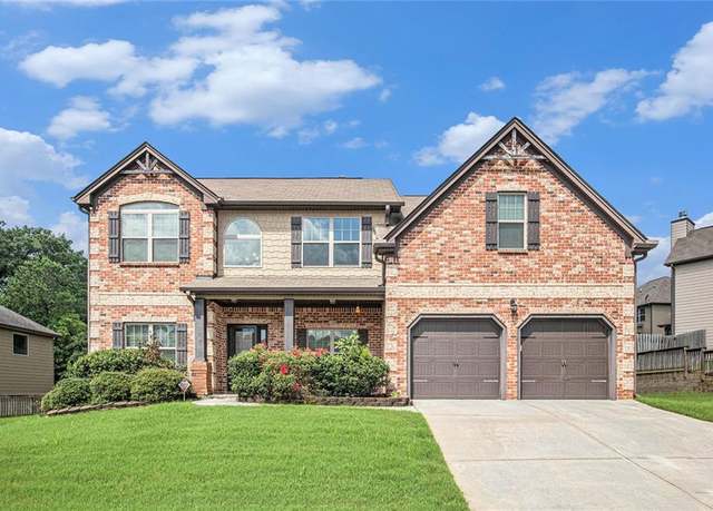 Property at 229 Traditions Drive Southeast Dr, Loganville, GA 30052, 5 beds, 4 baths