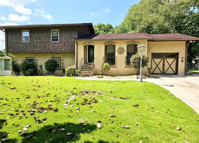 Property at 1244 Hickory Wood Dr NE, Woodstock, GA 30188, 4 beds, 3 baths