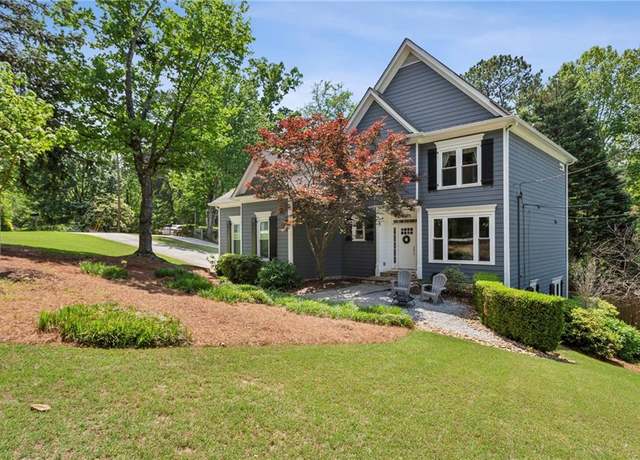 Property at 1904 Woodland Hills Ave NW, Atlanta, GA 30318, 4 beds, 3.5 baths
