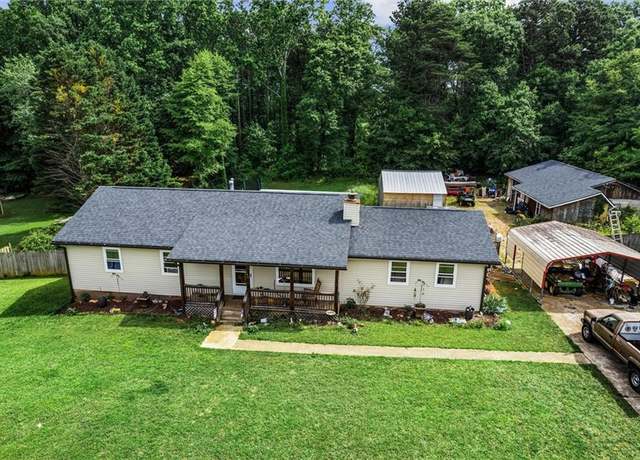 Property at 140 Wilbanks St, Buford, GA 30518, 4 beds, 2 baths