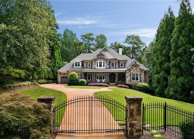 Property at 5575 Lake Island Dr, Atlanta, GA 30327, 5 beds, 7 baths