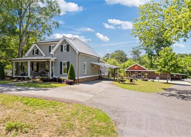 Property at 527 Main St, Suwanee, GA 30024, 7 beds, 6.5 baths