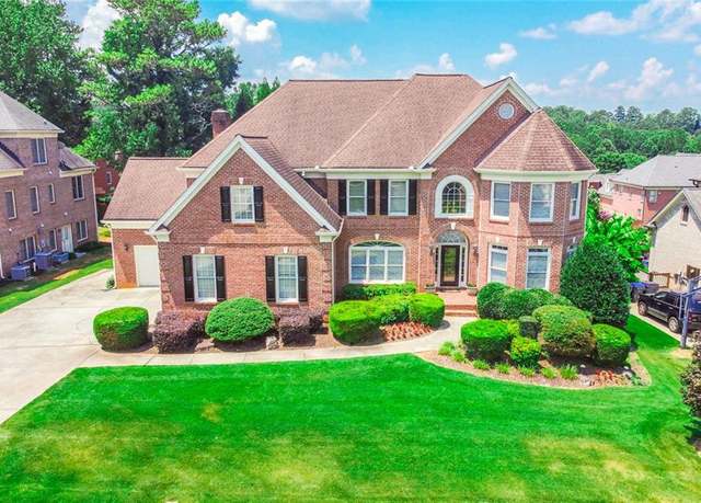 Property at 1136 Hiddenbrook Lane Ln, Suwanee, GA 30024, 6 beds, 5.5 baths