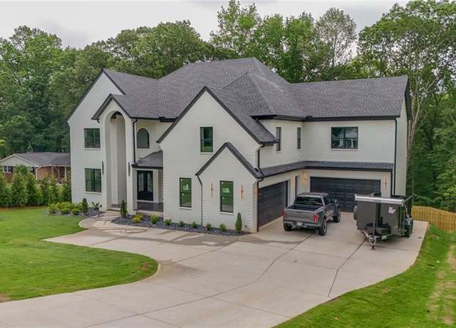 Property at 2977 N Bogan Rd, Buford, GA 30519, 5 beds, 5.5 baths