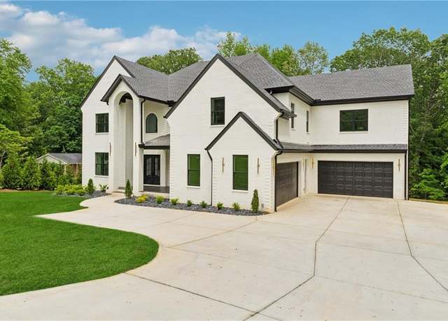 Property at 2977 N Bogan Rd, Buford, GA 30519, 5 beds, 5.5 baths