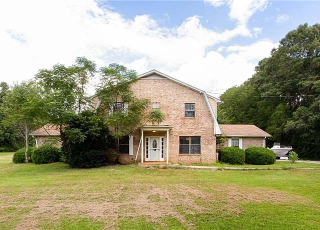 Property at 2360 Mount Carmel Rd, Hampton, GA 30228, 5 beds, 3 baths
