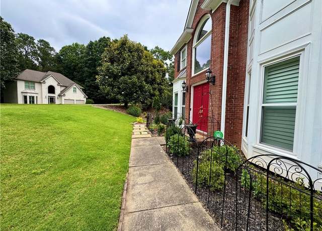 Property at 703 Overlook Pt, Woodstock, GA 30189, 5 beds, 3.5 baths