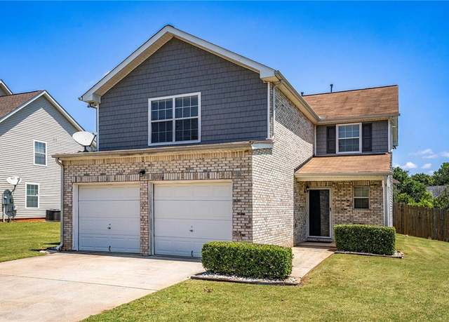 Property at 1932 Sawgrass Dr, Hampton, GA 30228, 4 beds, 2.5 baths